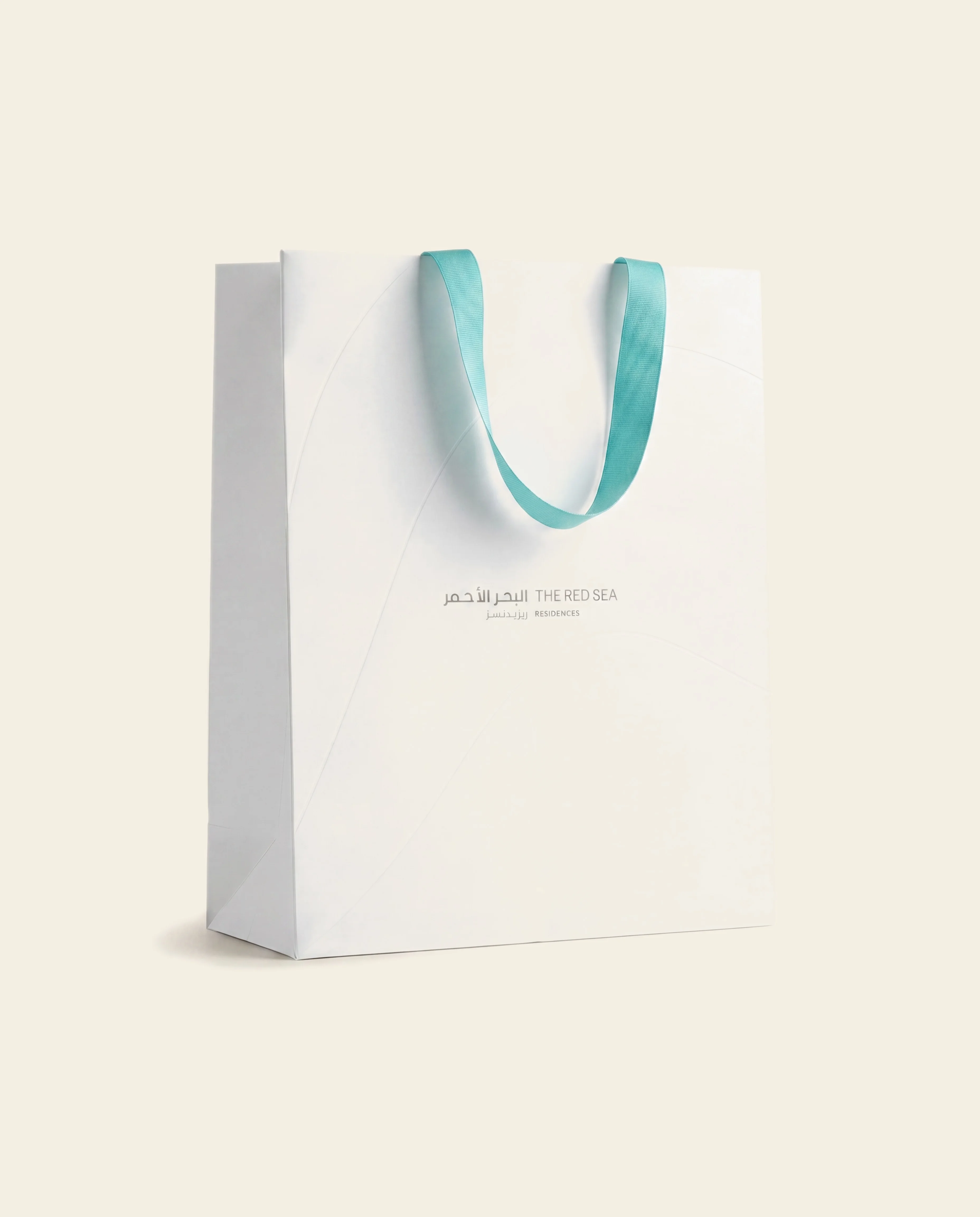 Red Sea Global corporate gifts. Branded paper bag.