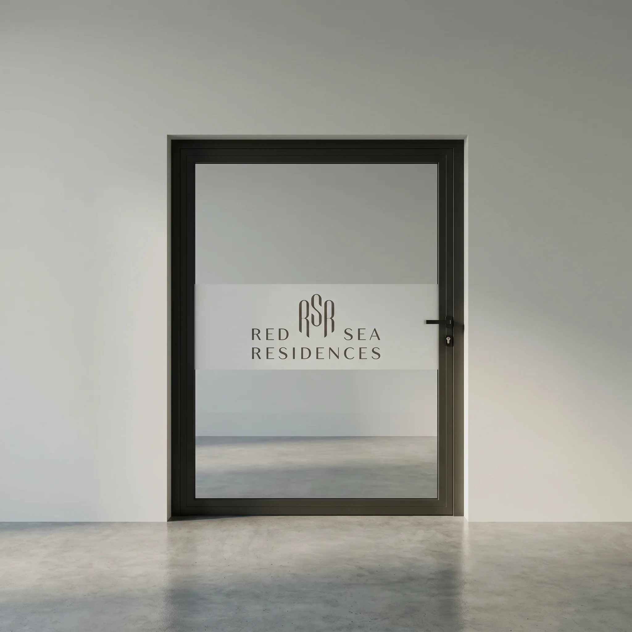 Red Sea Global facility branding. Glass door. Frosted logo.